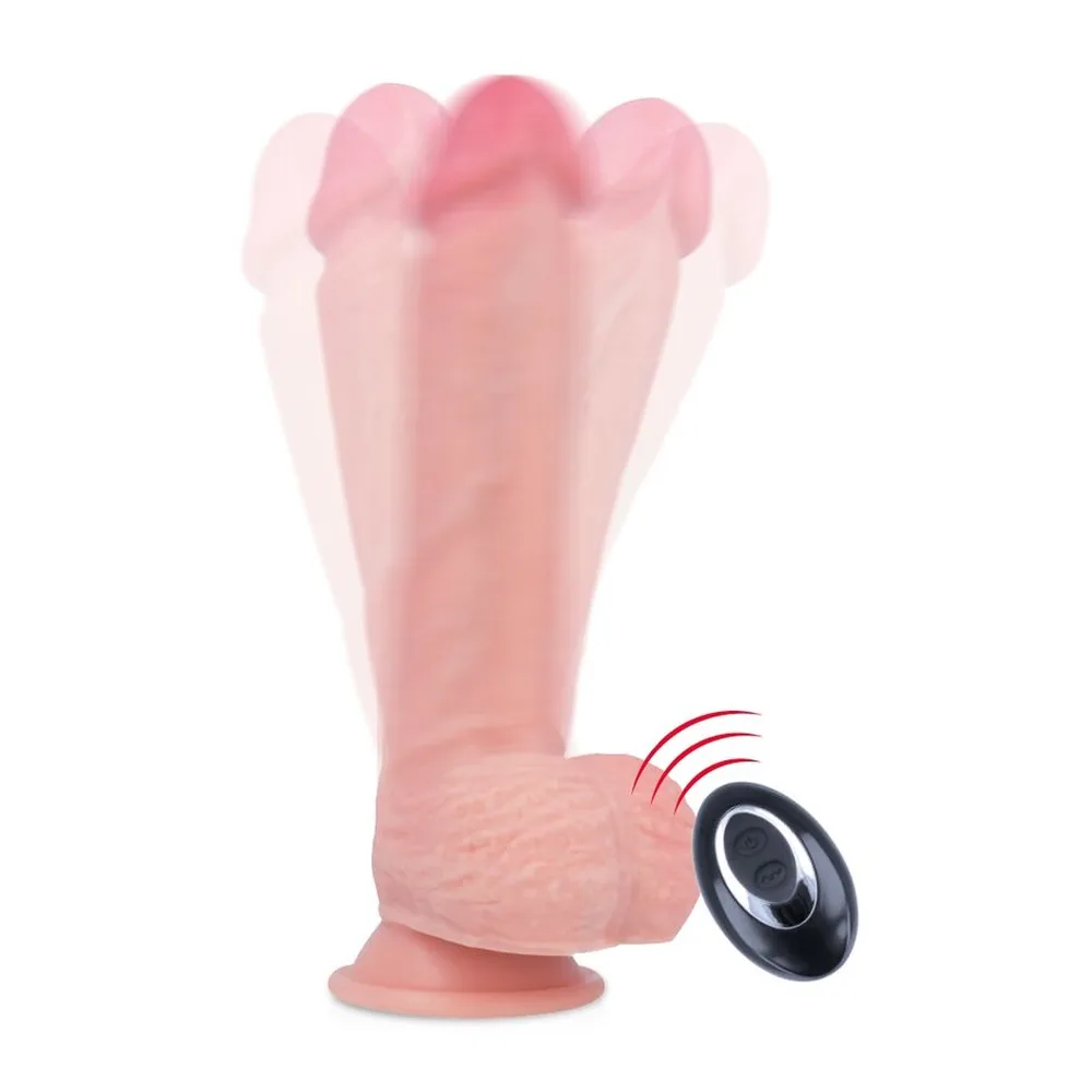 Vibromasseur réaliste en silicone rose avec tête bulbeuse textée, base ventousée et télécommande noire sans fil avec anneau de contrôle