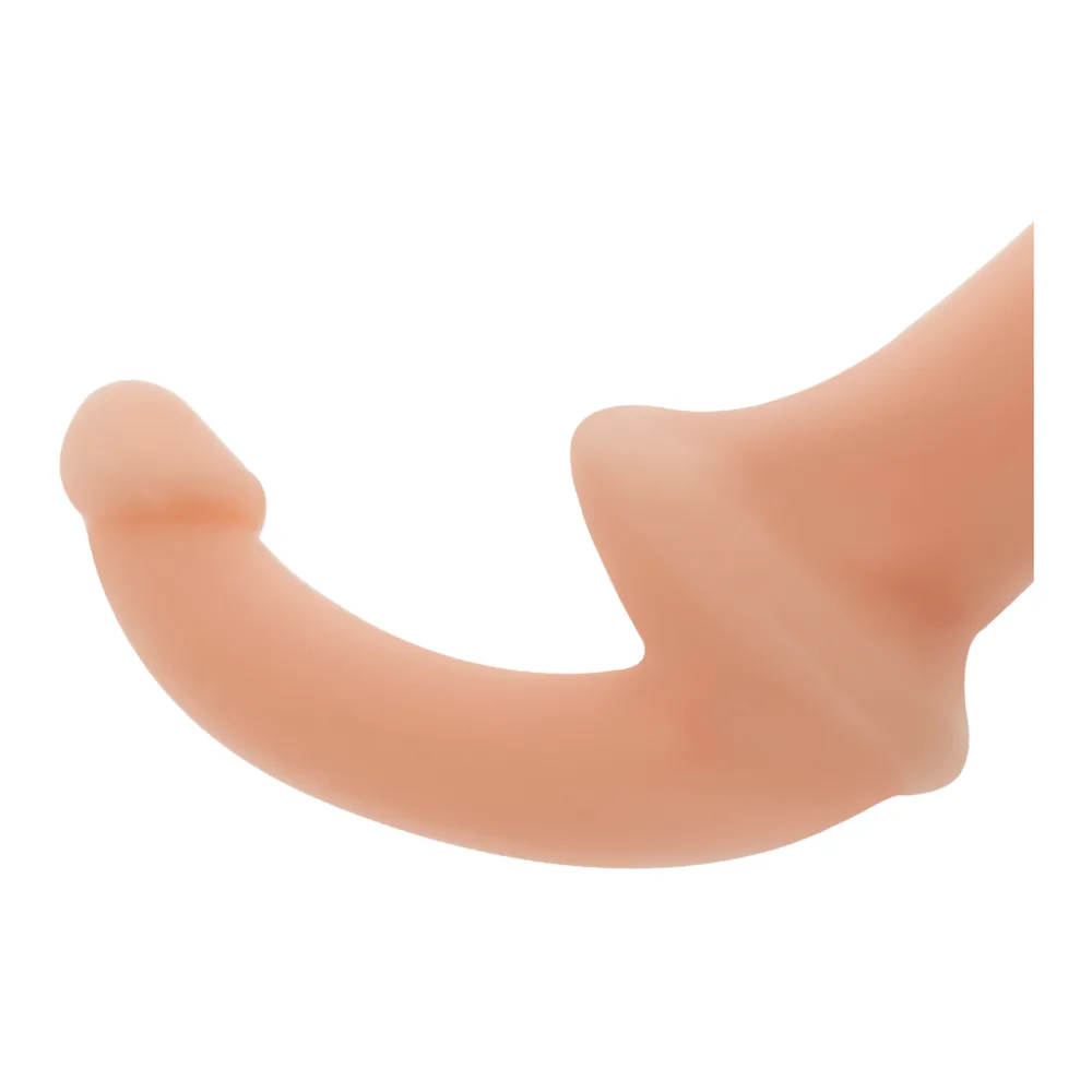 Gode double en silicone beige clair avec deux extrémités courbes, présenté devant son emballage Addicted Toys aux motifs géométriques noirs et blancs