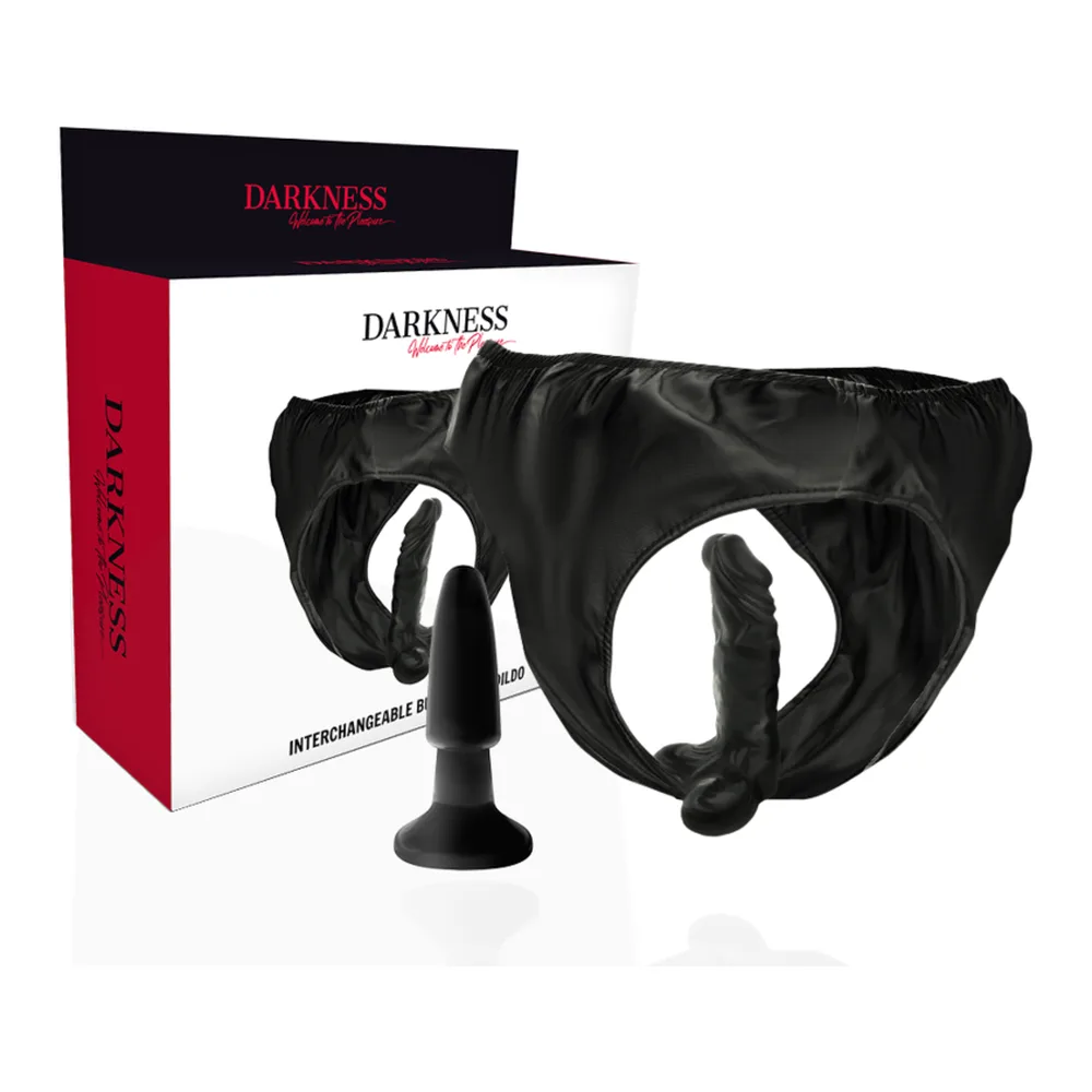Emballage blanc et rouge de la marque Darkness avec culotte noire en cuir PU, plug anal à ventouse et gode interchangeable en silicone noir