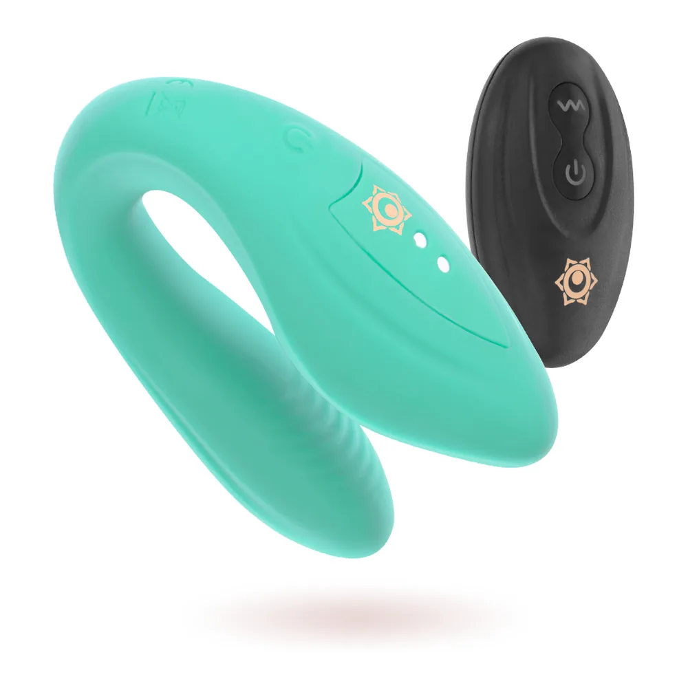Emballage bleu orné de motifs géométriques et produit turquoise en forme de U avec télécommande noire sans fil, stimulateur pour couples rechargeable