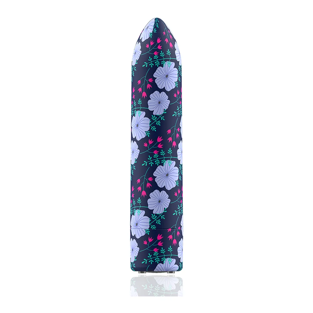 Stimulateur clitoridien rechargeable en silicone, motif floral avec fleurs blanches et feuillages roses et verts sur fond bleu marine, forme allongée à pointe arrondie