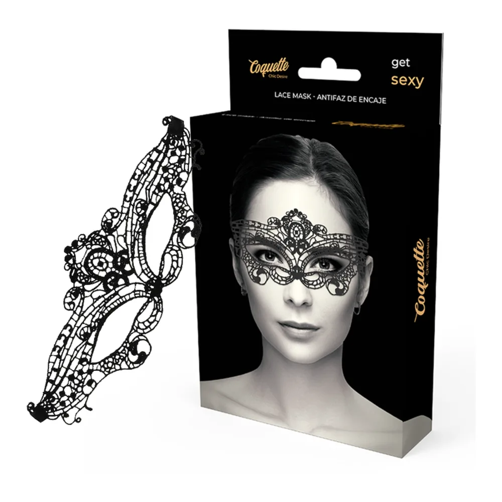 Masque de loup en dentelle noire ajourée avec motifs filigranés et floraux symétriques, encadrant les yeux sur fond blanc