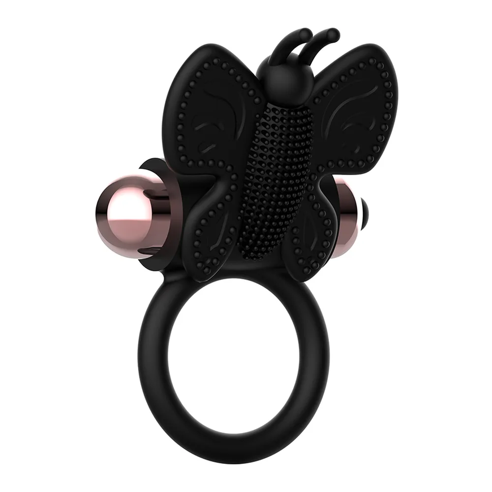 Cockring papillon en silicone noir avec anneau central rose poudré, manche noir, sur fond blanc