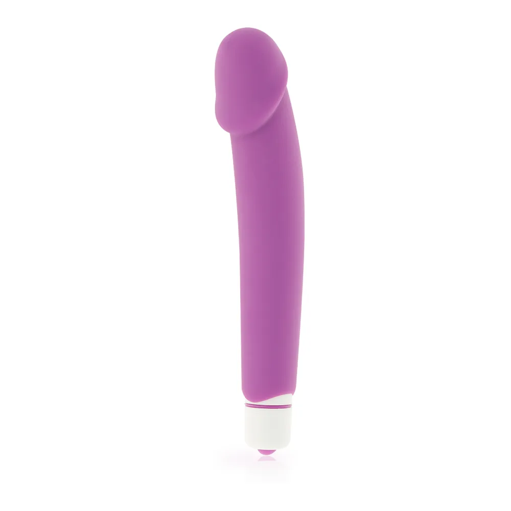 Vibromasseur en silicone rose vif avec fût incurvé lisse, embout arrondi, anneau blanc à la base, présenté avec son emballage blanc de la marque Dolce Vita indiquant 7 modes de vibration