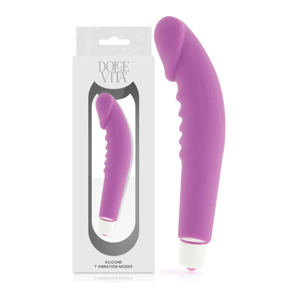 Vibromasseur en silicone rose vif avec nervures annelées sur toute la longueur, embout arrondi, affiché avec son emballage blanc et noir Dolce Vita indiquant 7 modes de vibration