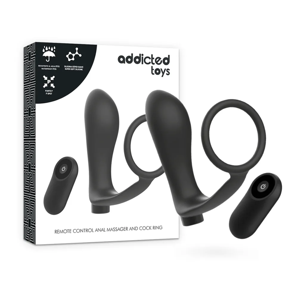 Boîte Addicted Toys noire et blanche contenant un anneau pénis avec plug anal intégré en silicone noir, deux télécommandes sans fil incluses