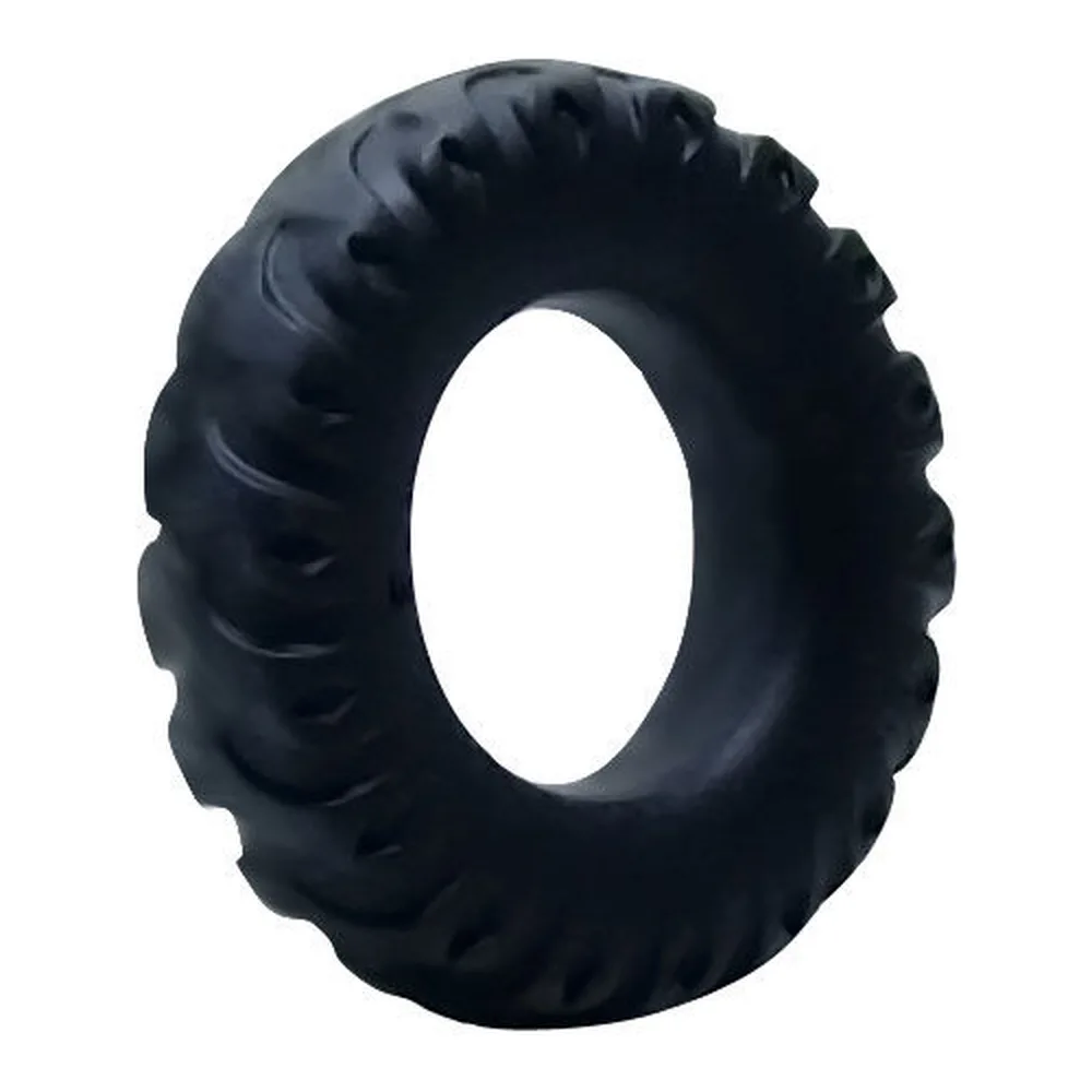 Cockring noir en silicone avec surface texturée de crampons en relief, sur fond blanc
