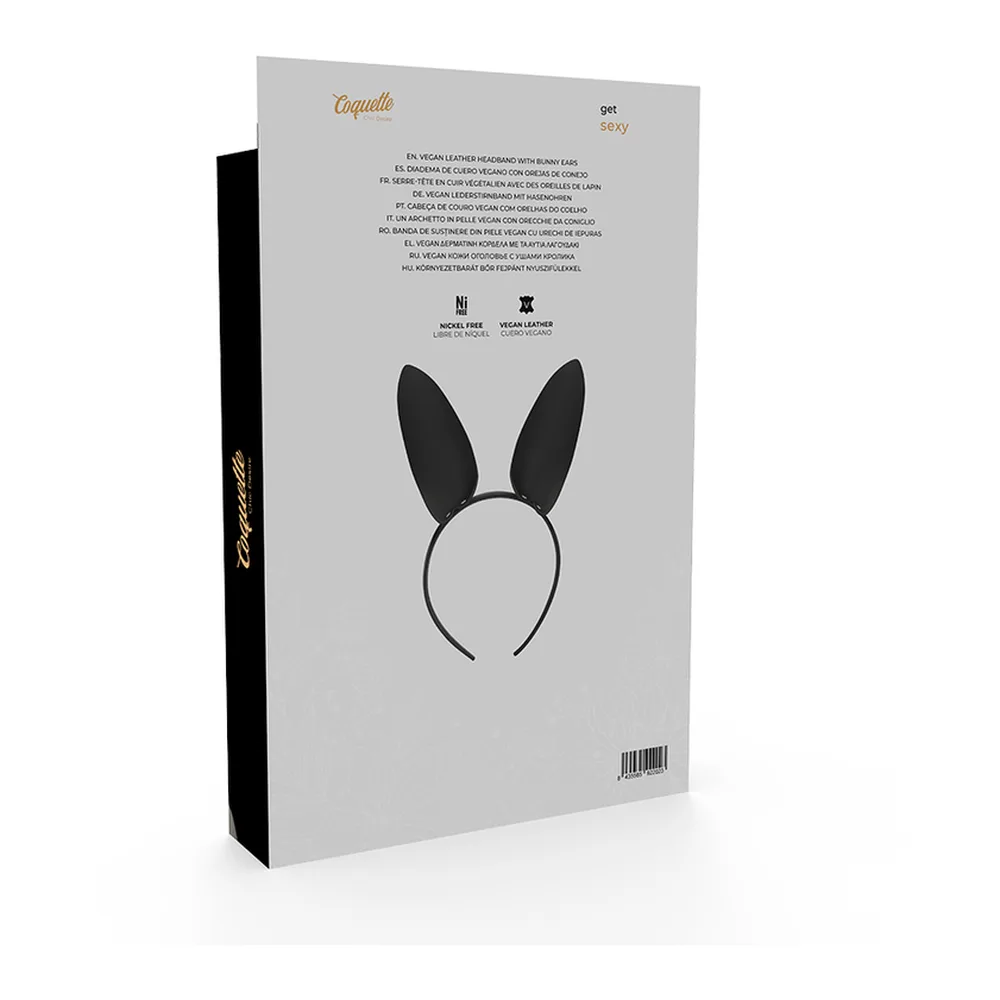 Serre-tête à oreilles de lapin noires en cuir végane aux oreilles souples, présenté sur modèle et son emballage noir