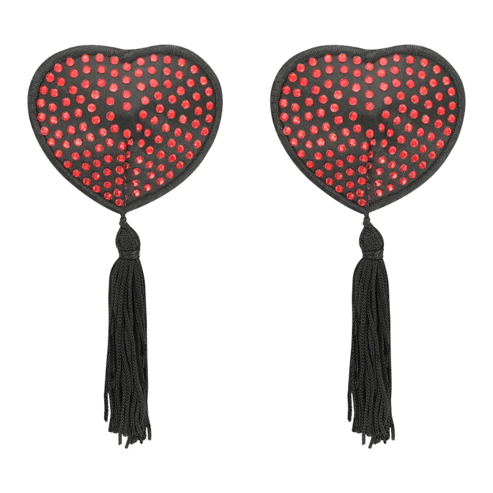 Cache-tétons en forme de cœur rouge parsemés de strass, avec pompon noir, présenté dans son emballage noir Coquelle