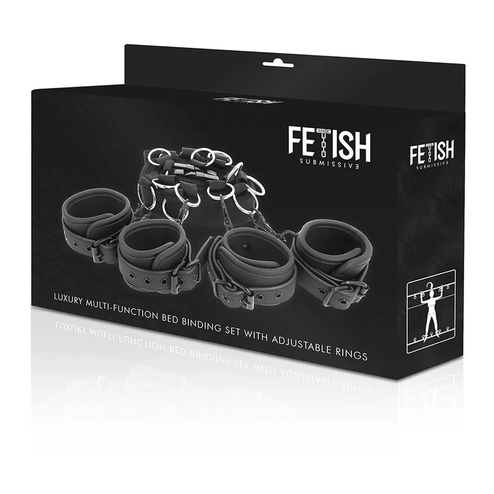Ensemble d'attaches de lit en cuir synthétique noir avec anneaux métalliques, composé de quatre bracelets de poignet et deux sangles, présenté avec son emballage noir Fetish Fundamentals