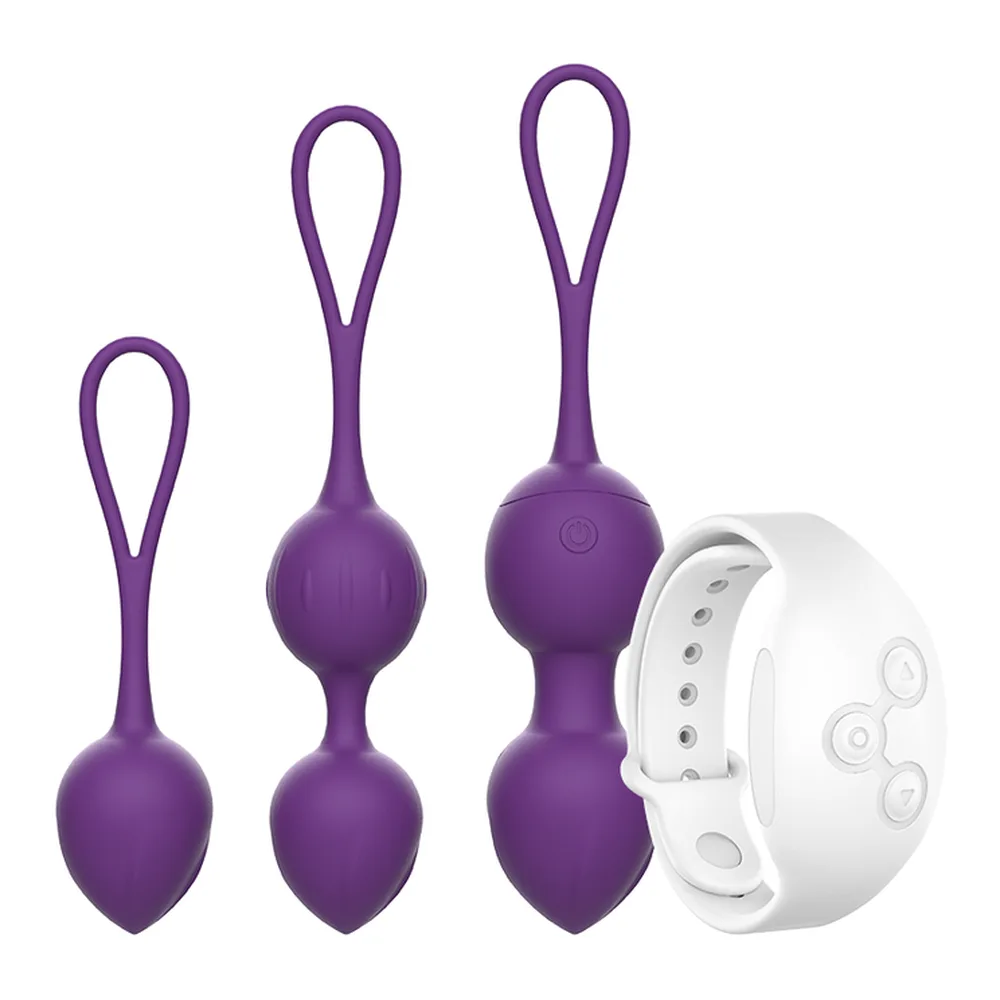 Trois boules de Geisha en silicone violet avec boucle de suspension, de tailles progressives, accompagnées d'une télécommande blanche filaire