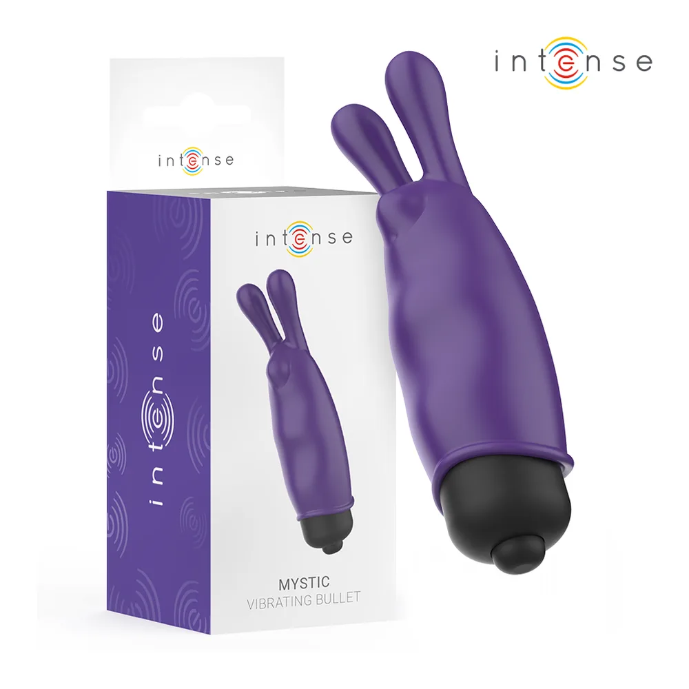 Emballage et bullet vibrant Mystique en silicone violet avec deux oreilles souples et embout noir, présenté de face sur fond blanc