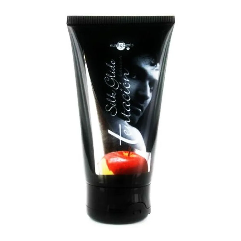 Tube noir de lubrifiant comestible au fruit de la passion avec étiquette graphique montrant un visage et une pomme rouge sur fond sombre