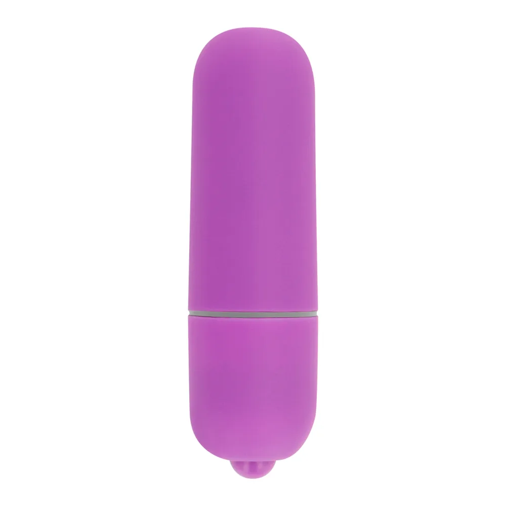 Mini balle vibrante en silicone rose fuchsia, forme arrondie avec séparation au centre, sur fond blanc