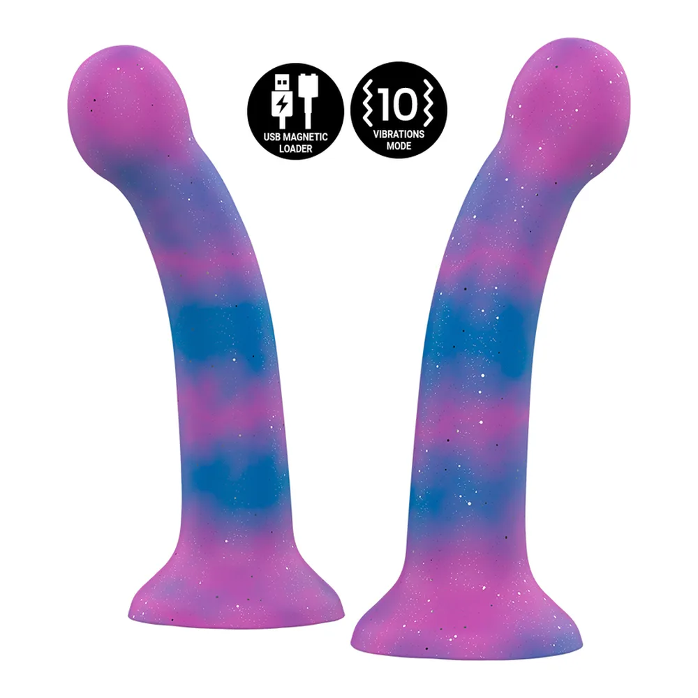 Gode vibrant Dion Galactic en silicone avec dégradé rose, violet et bleu à effet galaxie pailleté, base ventouse, présenté hors de son emballage noir et à côté de sa boîte
