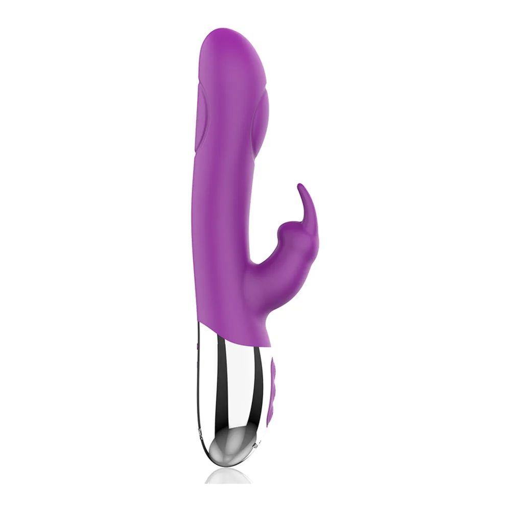Stimulateur clitoridien en silicone violet avec bras à deux pointes et corps insérable blanc et noir, sur fond blanc