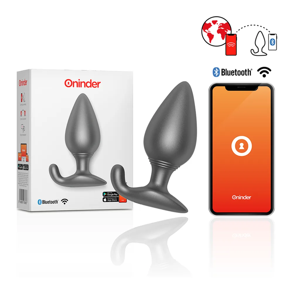 Plug anal gris anthracite en silicone, forme poire bombée, base large aplatie avec ergot latéral, surface lisse et brillante