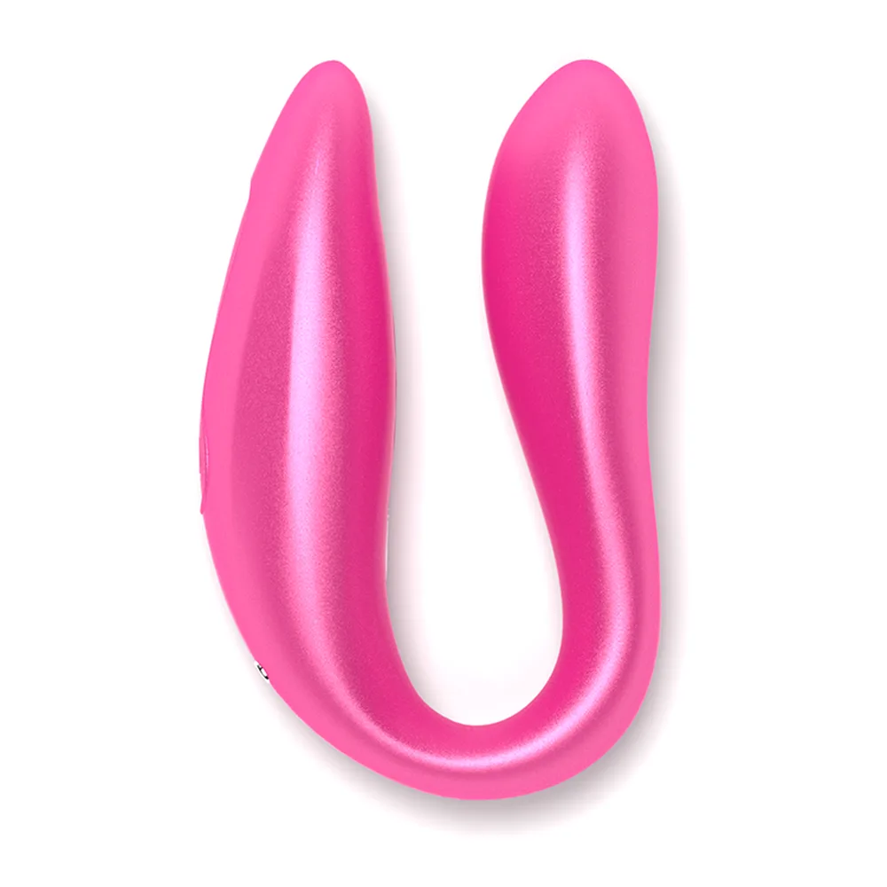 Vibromasseur point G de couleur rose vif en forme de U, avec deux branches arrondies et un revêtement lisse, présenté sur fond blanc
