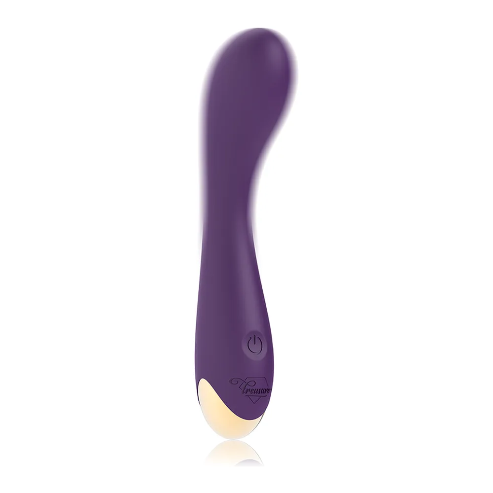 Vibromasseur violet incurvé avec embout or pâle et bouton marche on/off, sur fond blanc