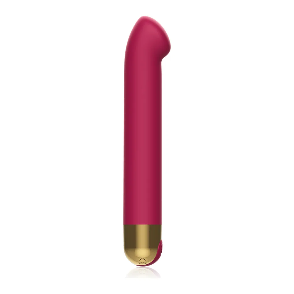 Stimulateur clitoridien en silicone rose foncé, forme cylindrique allongée à extrémité arrondie, base dorée avec logo CICI, fond blanc