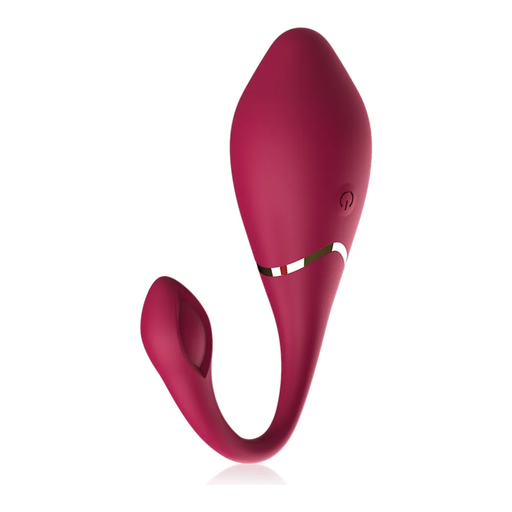 Œuf vibrant en silicone rose magenta avec télécommande, forme ergonomique bulbeuse et courbe, bouton de contrôle visible, connecteur de charge au centre, fond blanc