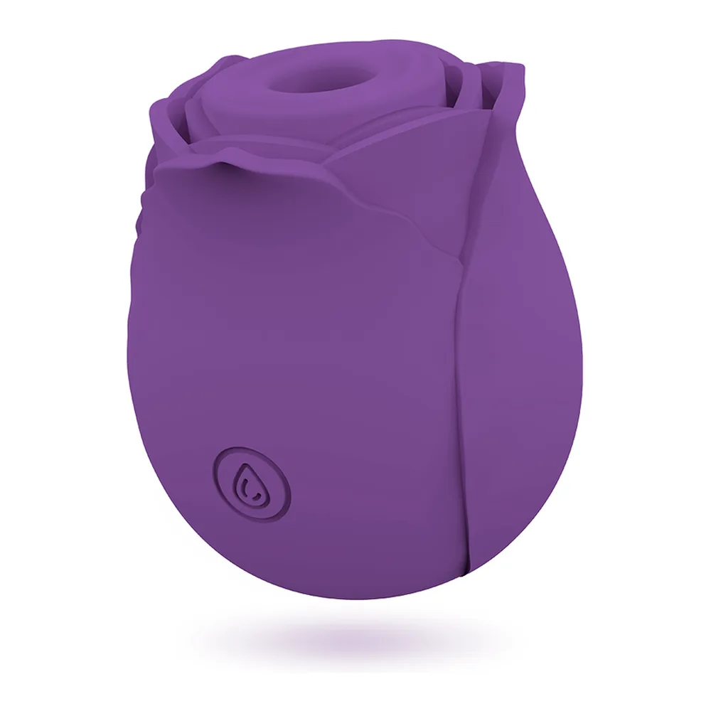 Emballage du stimulateur clitoridien Wave Clitoris Suction Édition, en forme de rose en silicone violet foncé avec feuilles imprimées rose et vert, présenté dans une boîte décorée de motifs floraux sur fond noir