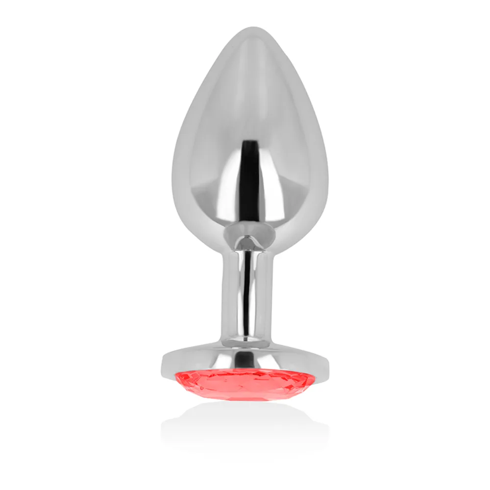 Plug anal en métal brillant, forme de goutte lisse et effilée, base circulaire ornée d'un cristal transparent, sur fond blanc