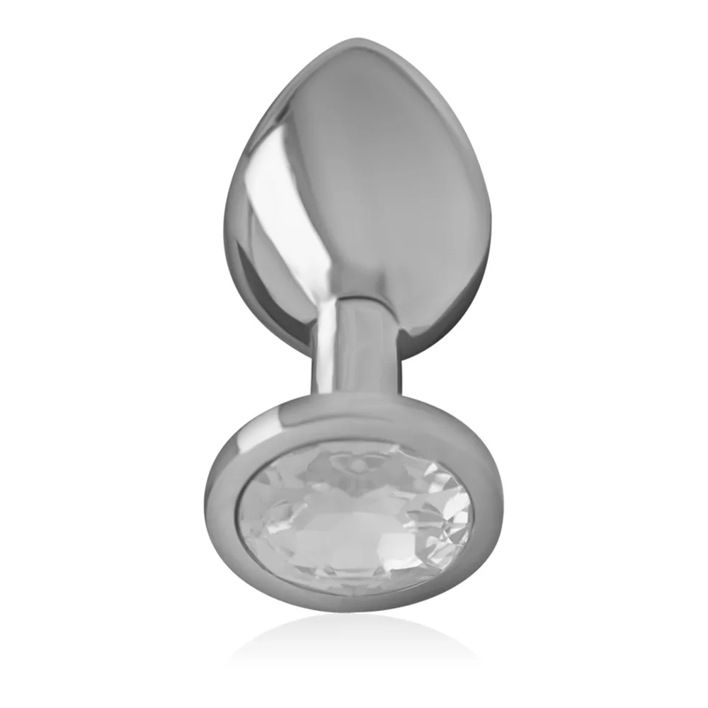 Plug anal en métal gris avec base ovoïde surmontée d'un cristal facetté violet, sur fond blanc