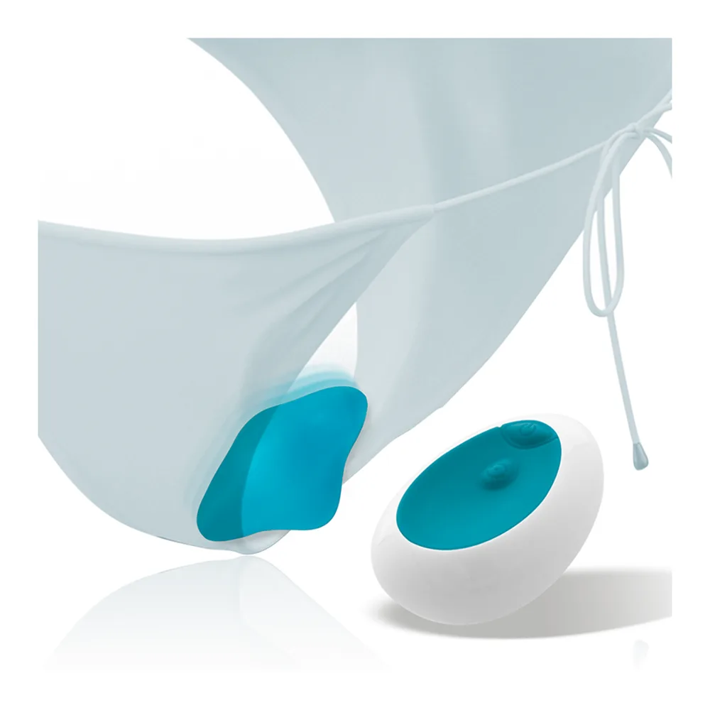 Culotte vibrante télécommandée bleu canard avec galet de stimulation et télécommande blanche ovale, sur fond neutre