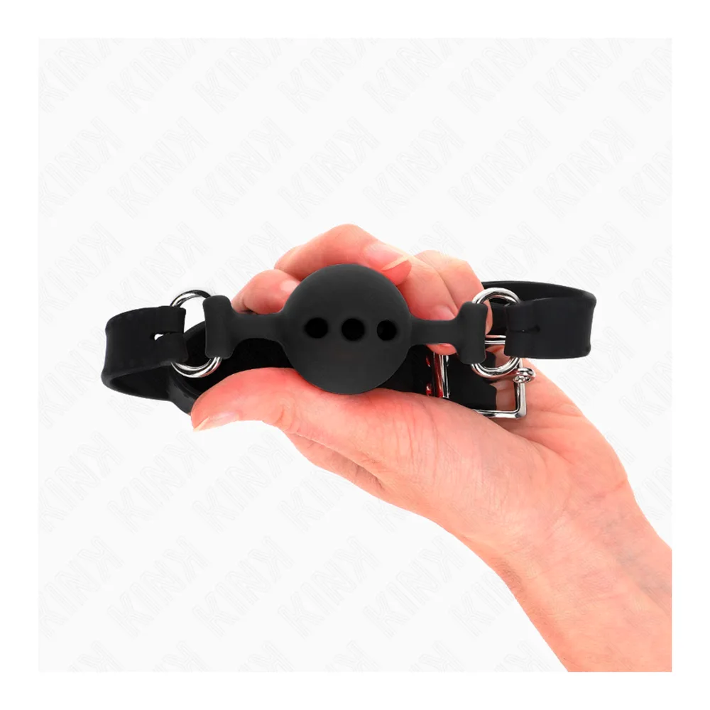 Bâillon boule en silicone noir avec sangle d'ajustement, anneaux métalliques argentés et boucles de fixation, sur fond blanc