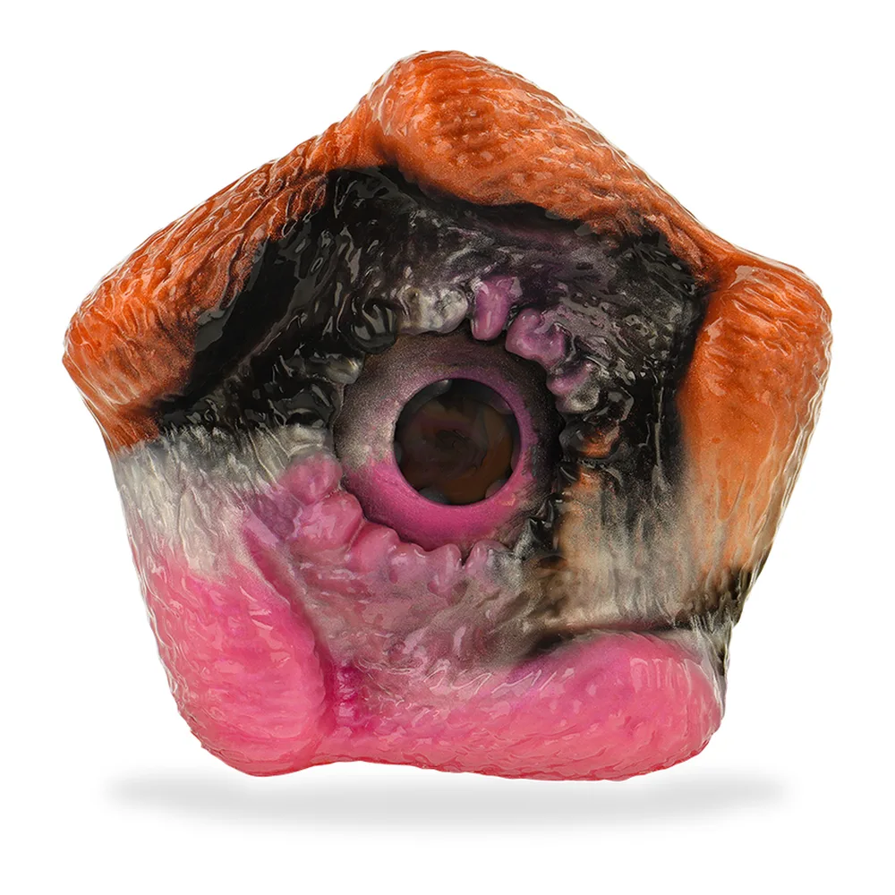 Masturbateur Cyclops en silicone multicolore rose, orange et noir, sculpture de cyclope en relief avec ouverture en haut, bloc de 1000 g sur fond blanc