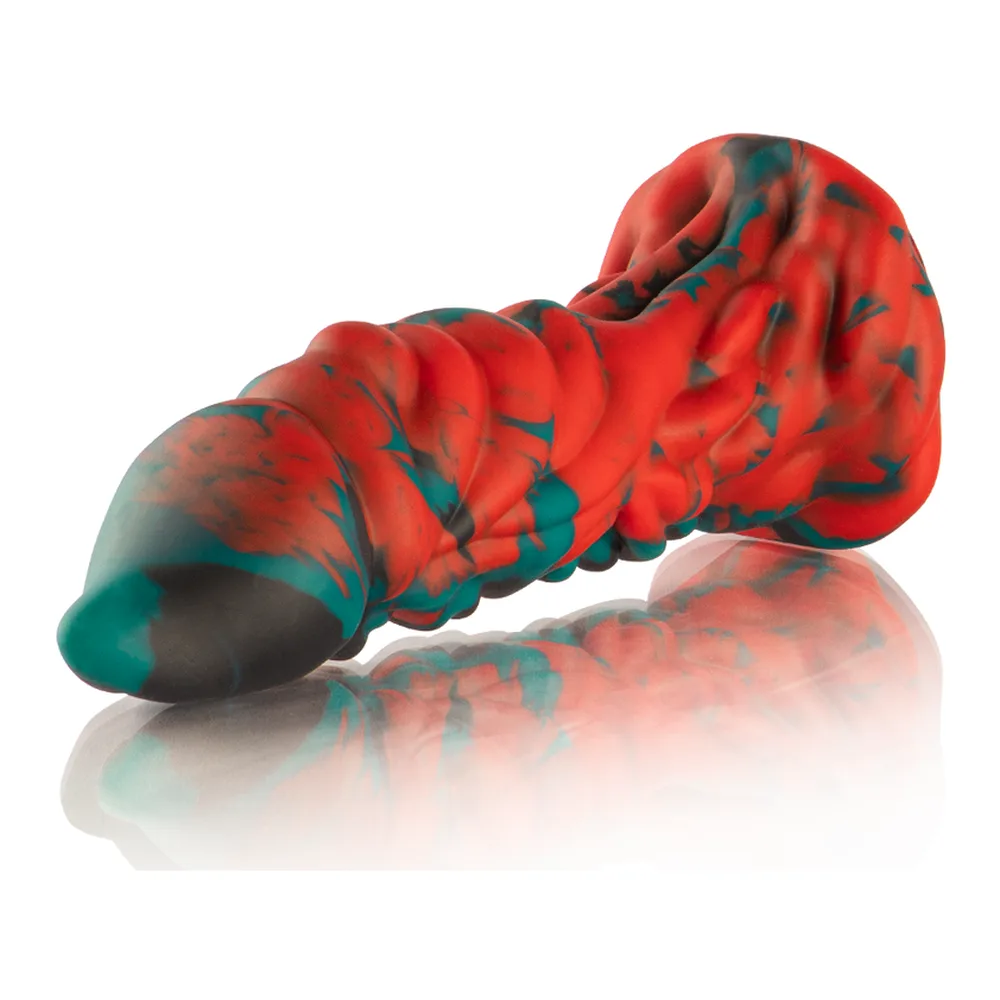 Gode en silicone rouge et noir aux formes ondulées, avec détails en teintes turquoise, base évasée sur fond blanc