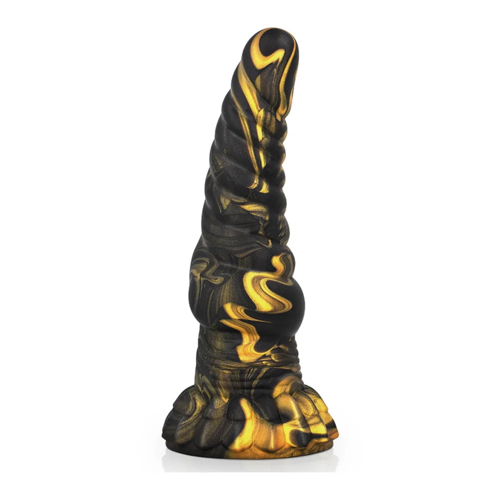 Gode en silicone noir et or motifs de créature mythologique, texture ondulée, base évasée en relief, sur fond blanc
