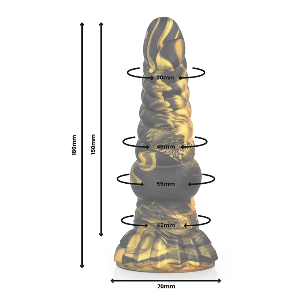 Gode en silicone noir et or motifs de créature mythologique, texture ondulée, base évasée en relief, sur fond blanc