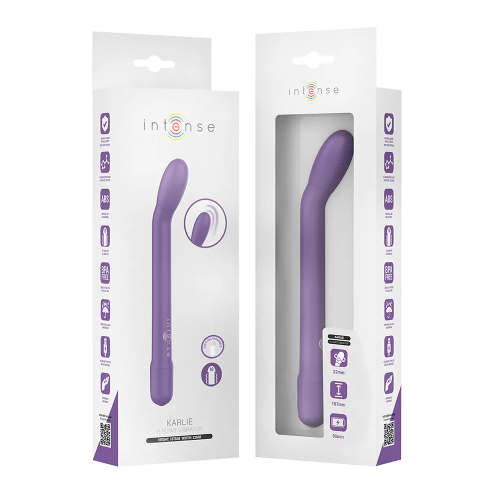 Stimulateur clitoridien Intense Karlie en silicone violet rigide, tenu dans deux mains écartées pour montrer sa forme allongée et fine, sur fond blanc