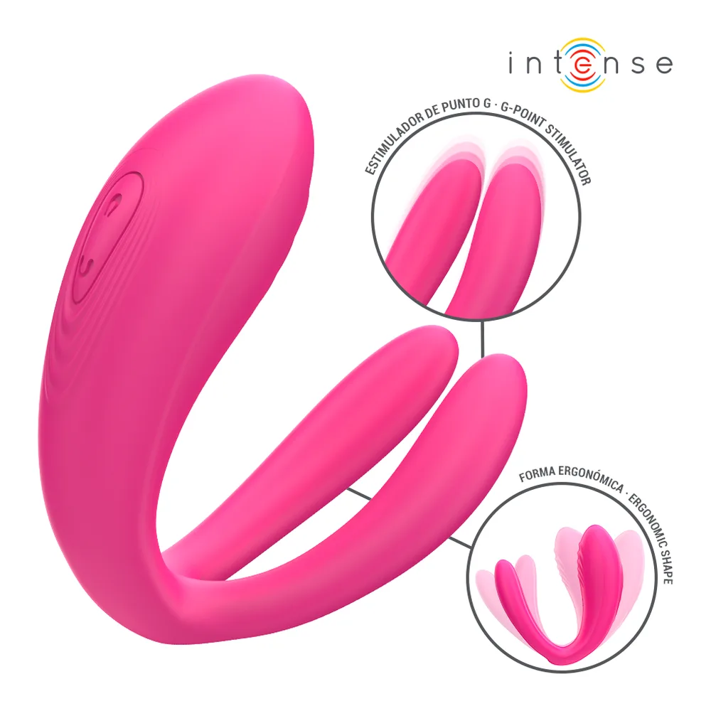 Emballage et contenu du stimulateur Julia : boîte blanche avec pictogrammes d'utilisation, stimulateur rose vif en silicone avec deux branches courbes, télécommande noire et grise sans fil