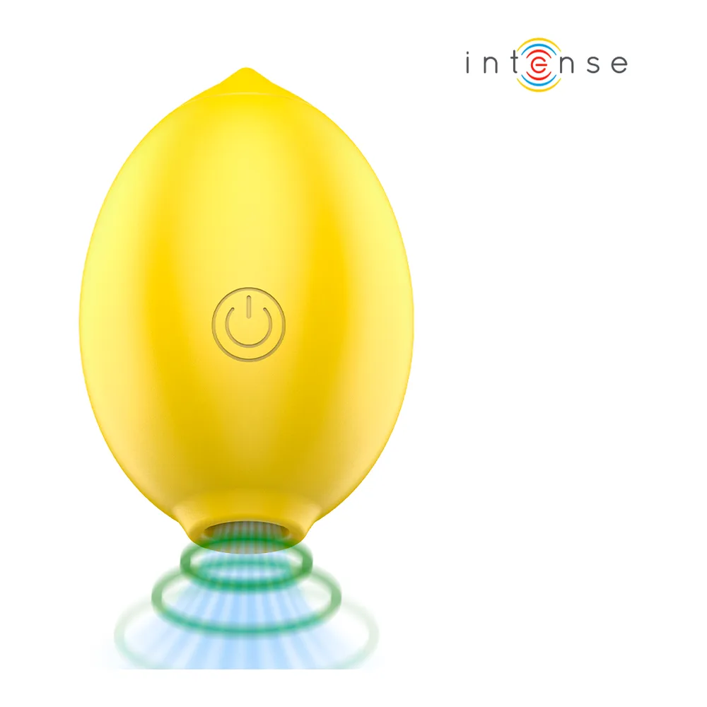 Stimulateur clitoridien en silicone jaune citron, forme ovale avec bouton d'allumage au centre, base verte et bleue lumineuse sur fond blanc