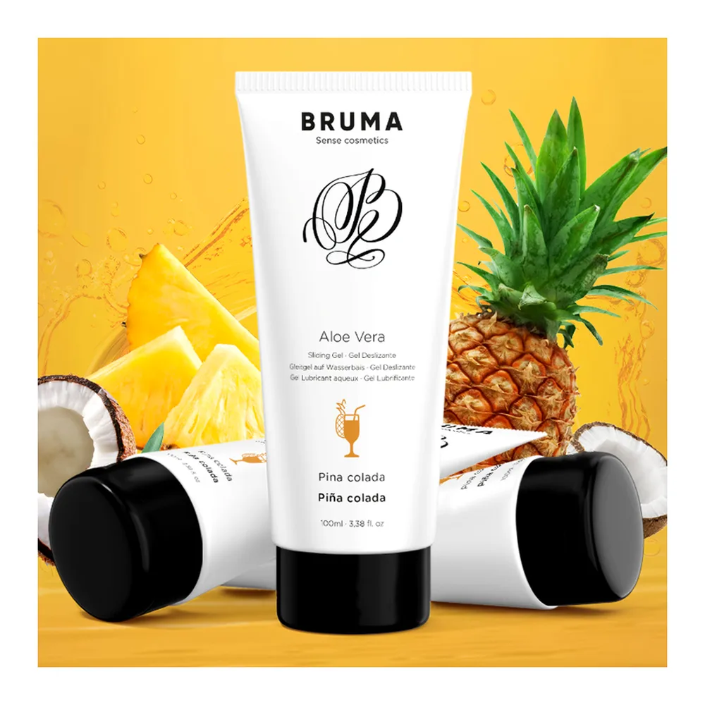 Tube blanc de gel lubrifiant Bruma à base d'aloe vera, saveur pina colada, avec capuchon noir, sur fond dégradé jaune pâle