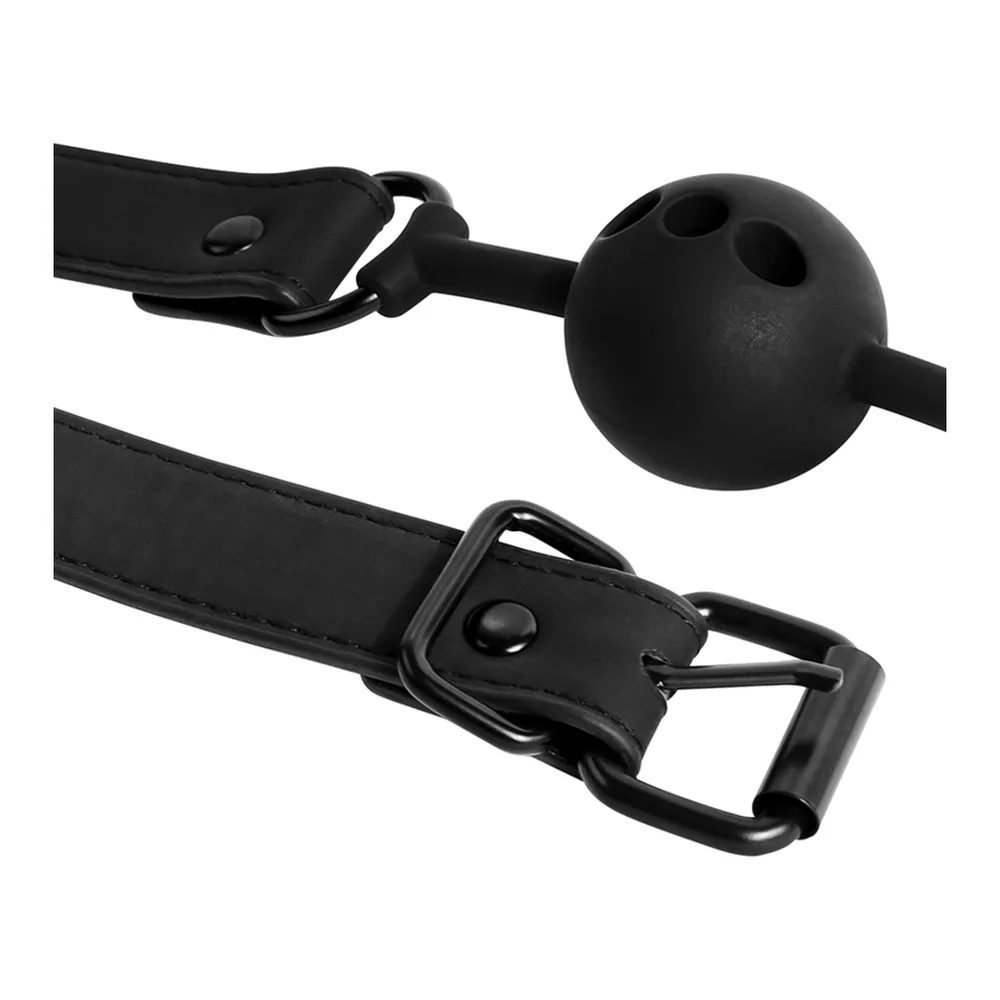 Bâillon boule en silicone noir avec trous de respiration, lanières noires ajustables terminées par boucles de dégagement rapide
