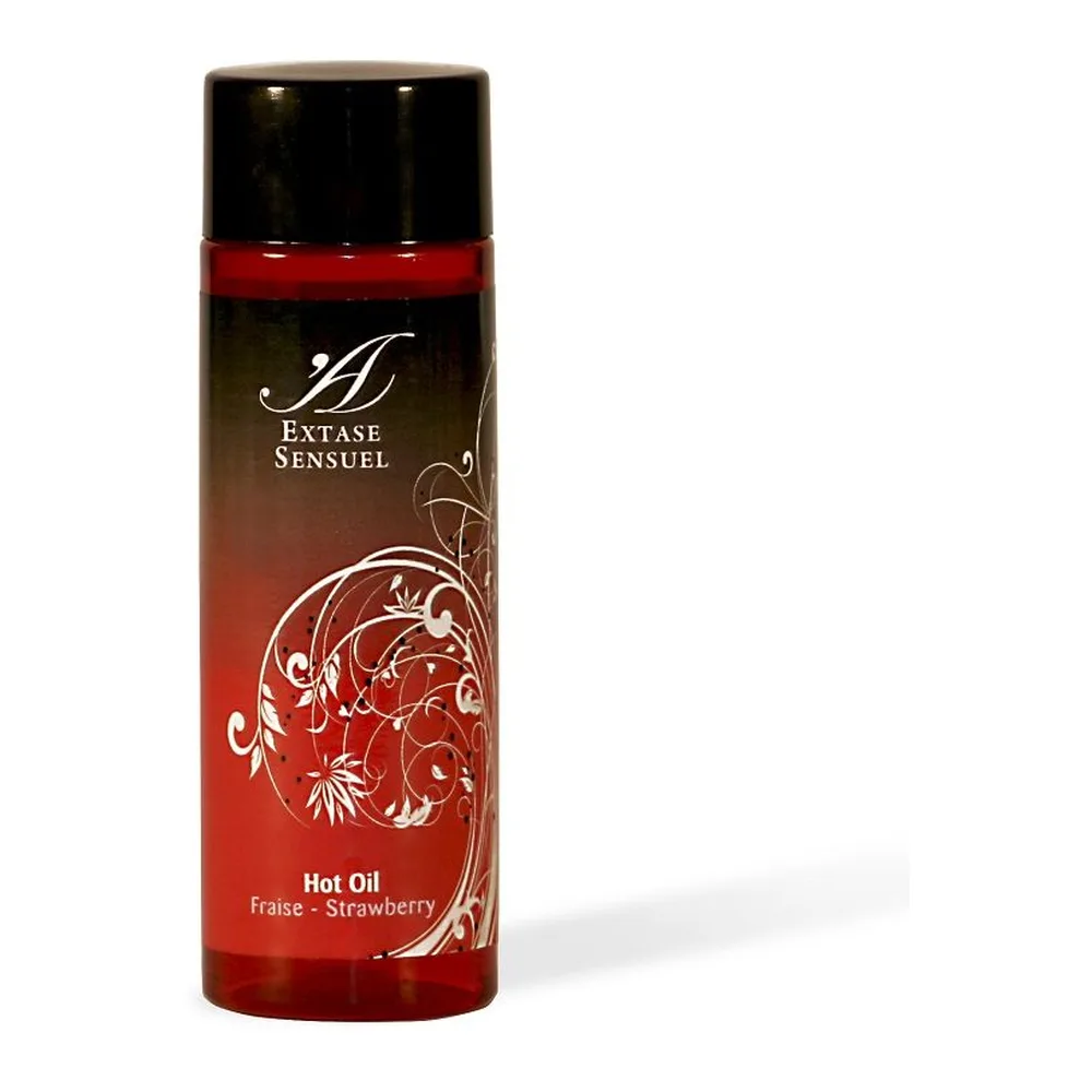 Flacon airless noir et rouge de 100 ml d'huile de massage effet chaud parfum fraise, étiquette ornée de motifs floraux blancs et texte doré Extase Sensuel
