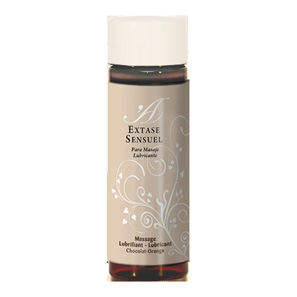 Flacon airless beige avec bouchon blanc et bande noire, étiquette « Extase Sensuel » motifs floraux blancs, texte « Massage Lubrifiant - Lubricant Chocolat-Orange »