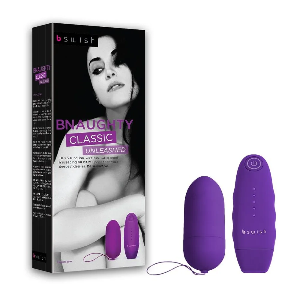 Vibromasseur bullet violet avec télécommande filaire assortie, capuchon de protection visible, fond blanc