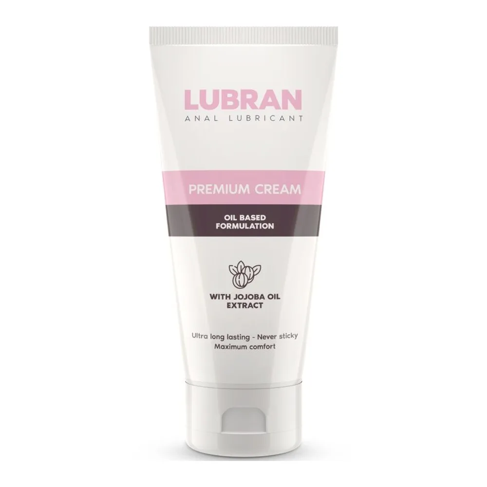 Tube blanc de lubrifiant anal Lubran Premium Cream à base d'huile, avec bande rose et grise, contenant de l'extrait de jojoba, sur fond blanc