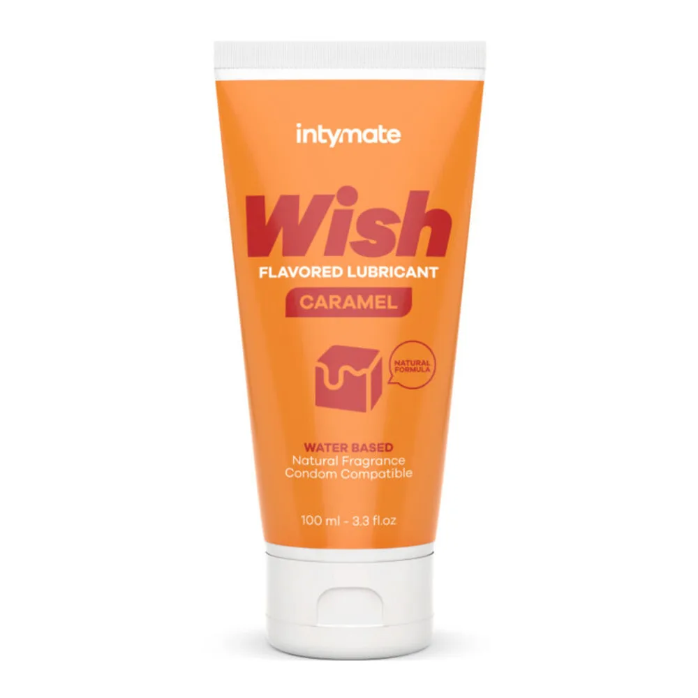 Tube orange de lubrifiant Wish aromatisé caramel, 100 ml, base eau, avec bouchon blanc et étiquette indiquant formule naturelle compatible préservatifs
