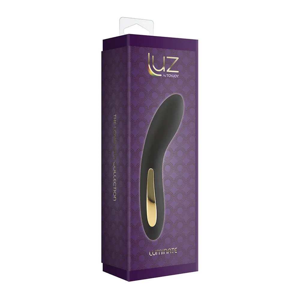 Vibromasseur courbe en silicone noir avec détail doré, fond blanc