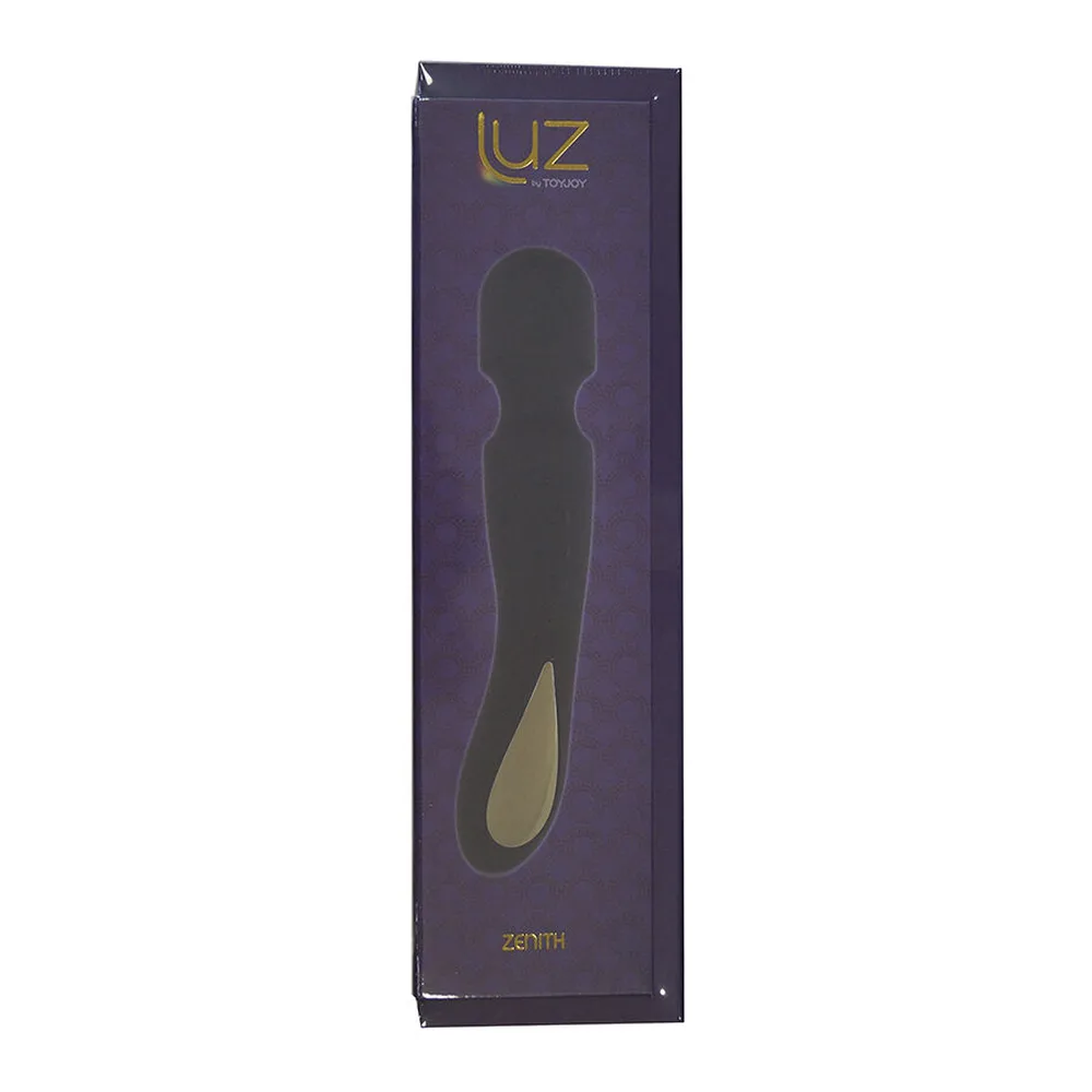 Wand noir en silicone avec tête arrondie, corps texturer de points tactiles et détail doré en bas, sur fond blanc