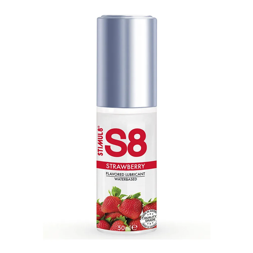 Flacon de 50 ml de lubrifiant comestible à base d'eau parfum fraise, avec capuchon argenté et étiquette blanche ornée de fraises rouges