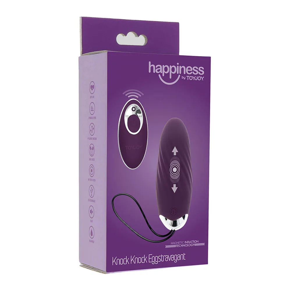 Œuf vibrant violet foncé avec télécommande sans fil assortie, corps lisse avec zones texturées et boutons de contrôle, cordon de transport noir inclus