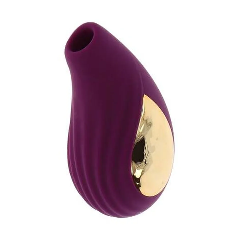 Stimulateur clitoridien Divine en silicone violet avec détail doré, forme de goutte arrondie, sur fond blanc