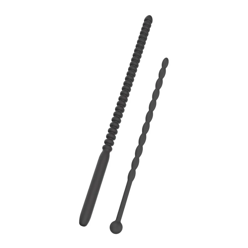 Dilatateur urétral en silicone noir avec surface striée progressive et embout sphérique, présenté isolé sur fond blanc